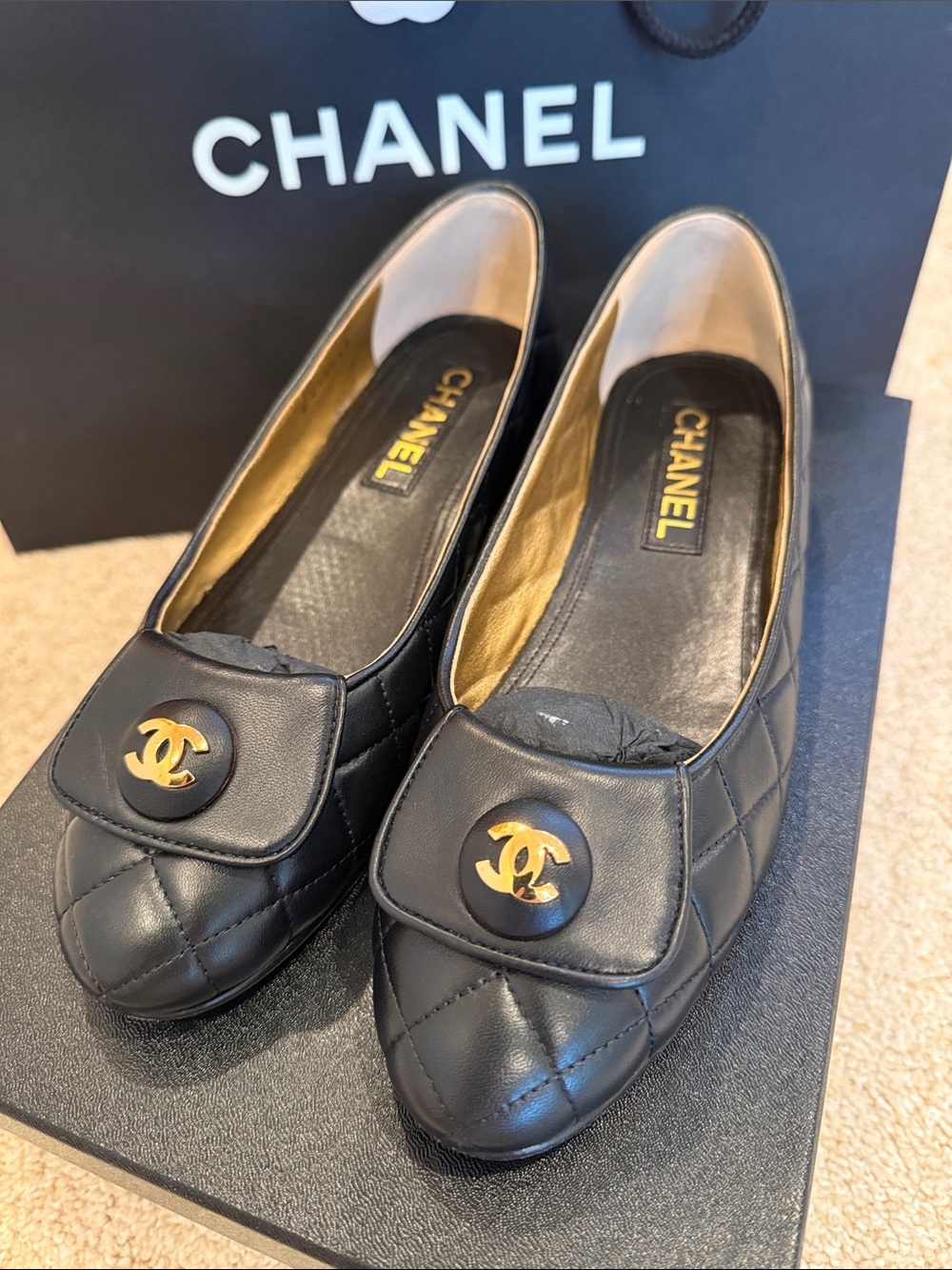 CHANEL Black Quilted Leather Ballet Flats with Gold CC Medallion